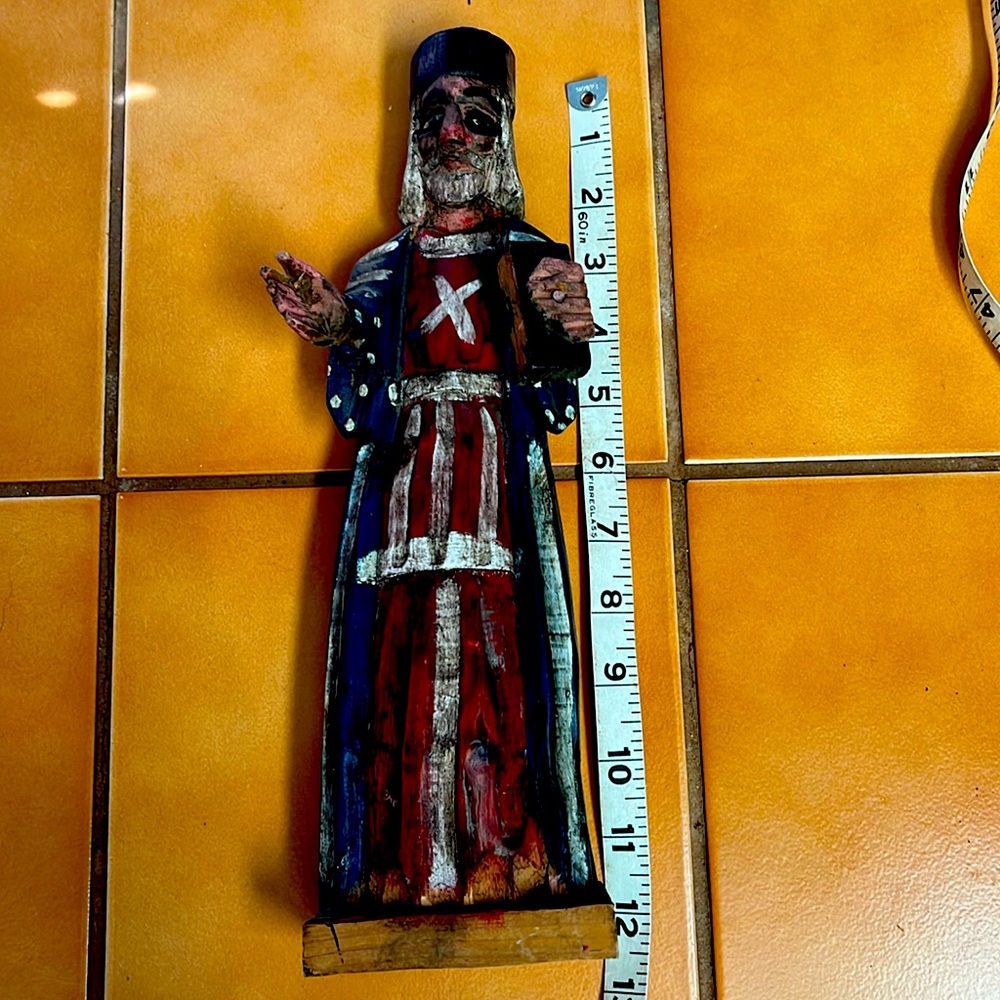 Antique Santos religious figure. His book and hand moves. Foot tall.